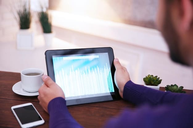 A person using a tablet to review different investment options for their HSA, with charts and graphs displayed on the screen.